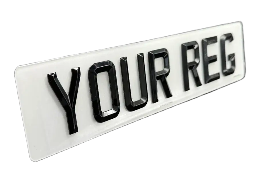 White number plate with raised black Retro characters and bevelled edges.
